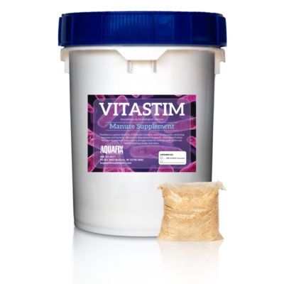 Bucket with an application packet of VitaStim Manure Supplement to help return nitrogen from the manure back to the soil, while reducing sludge, foam, and odors.