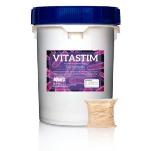 A pail, with a packet of product in front of it, of VitaStim Surfactants, designed to reduce and manage surfactants in wastewater treatment processes.